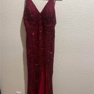 Prom dress. Size small. New with tags.  Red Sequin.